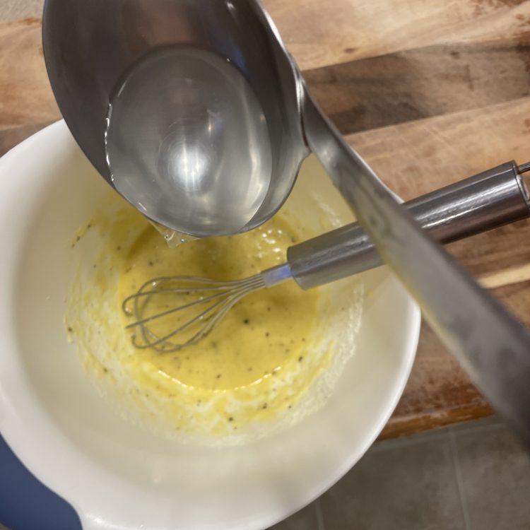 Carbonara: Adding pasta water to the eggs and cheese