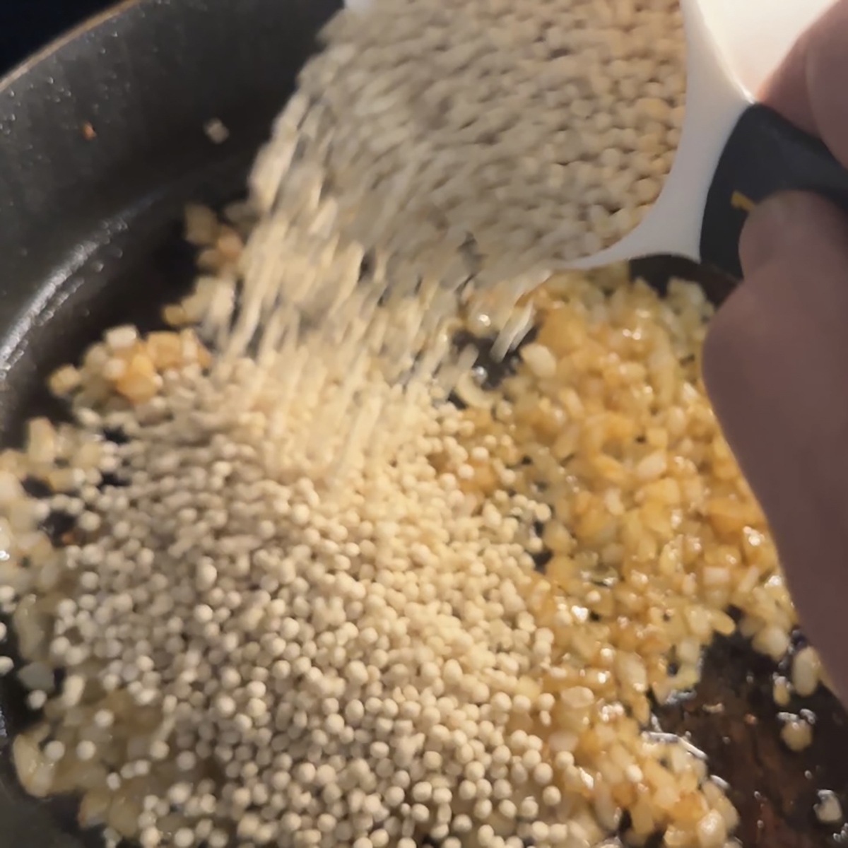 Chicken and Couscous Adding Couscous to the Pan
