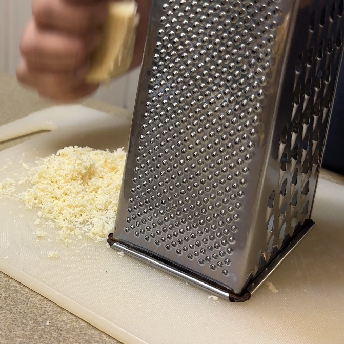 Chicken and Couscous Grating Parmesan